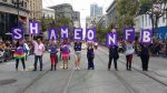 protestors at SF Pride holding signs saying "Shame on Facebook"