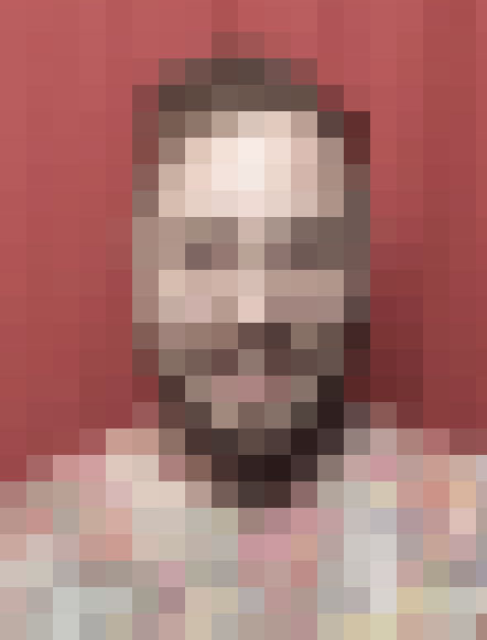 intentionally pixelated photo of Harris from a photobooth
